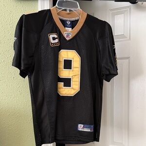 Reebok Black and Gold Sports Jersey